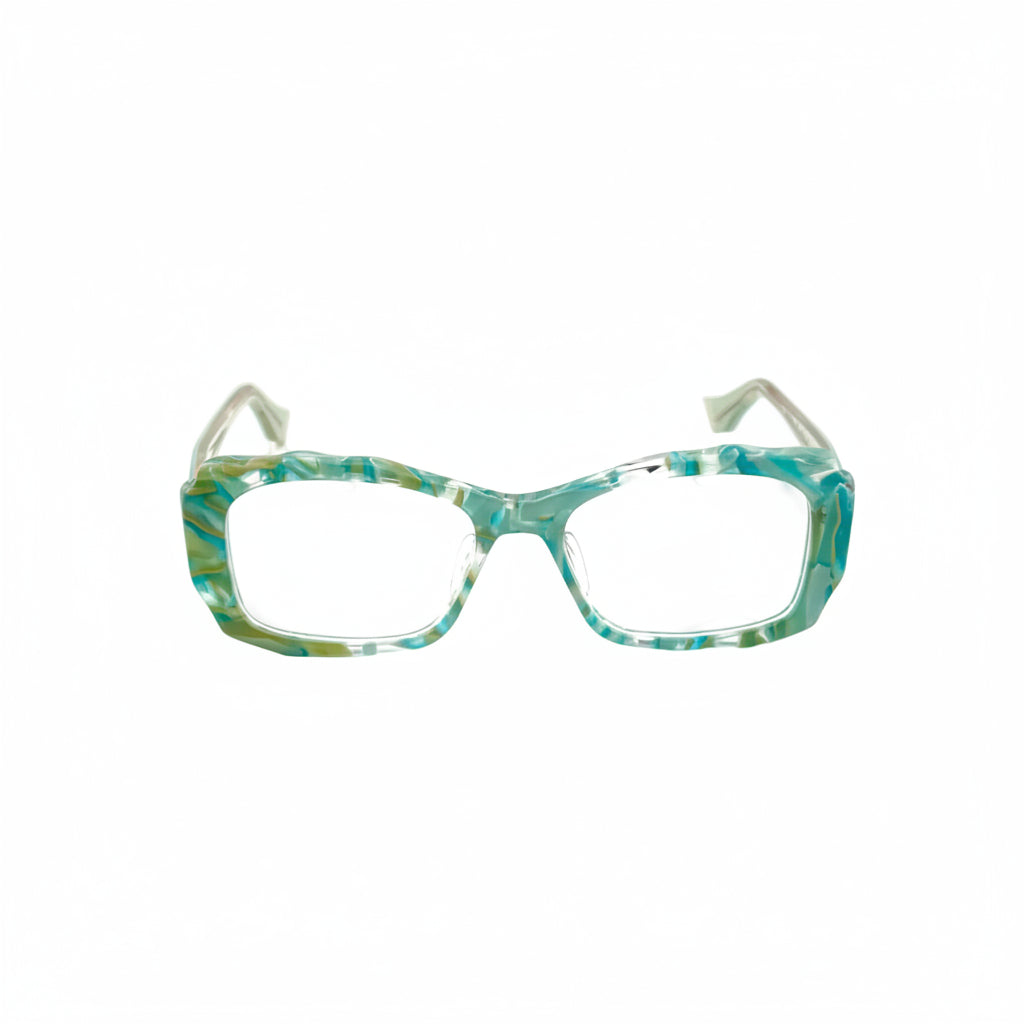 Teal and white patterned eyeglasses on a white background