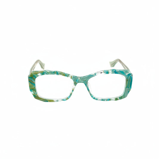 Teal and white patterned eyeglasses on a white background